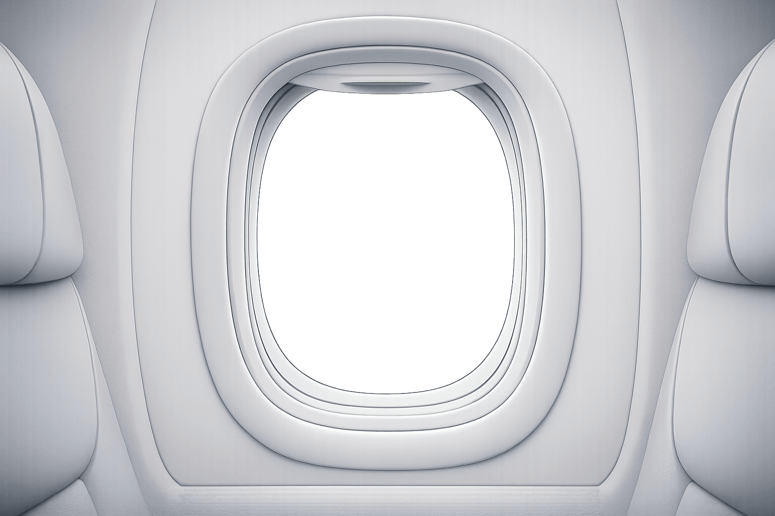 Airplane window before the city reveal